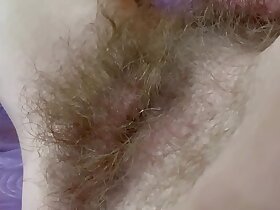 Animalistic hairy pussy objurgate with huge clit rubbing orgasm