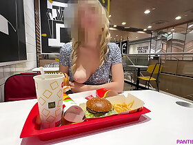 Hot blonde flashes increased by masturbates big pumped pussy in public eatery